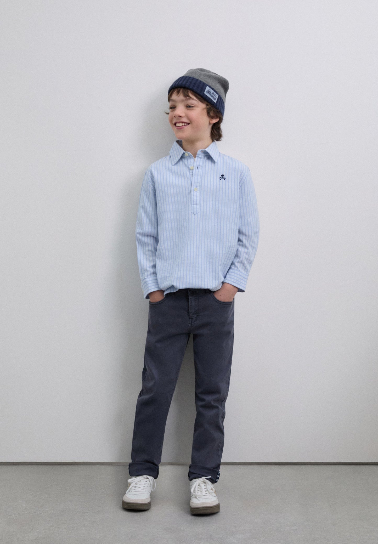 STRIPED POLO SHIRT WITH SKULL