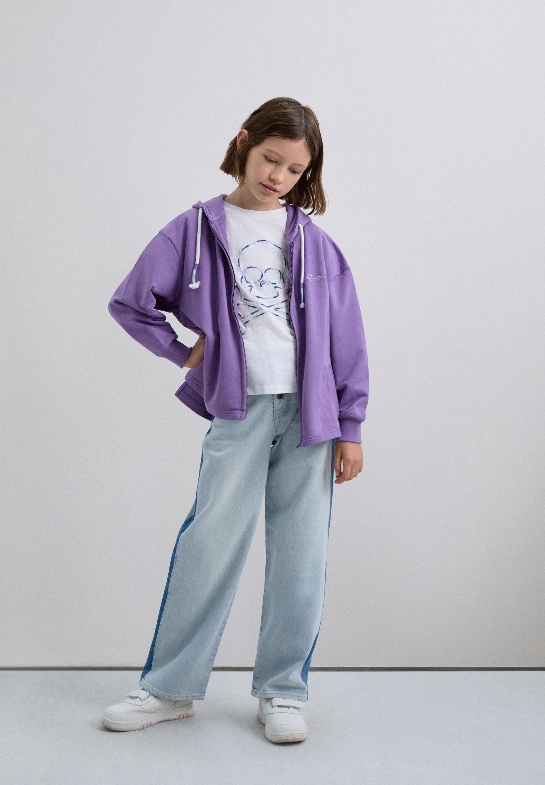 FLARED TROUSERS WITH FRINGING