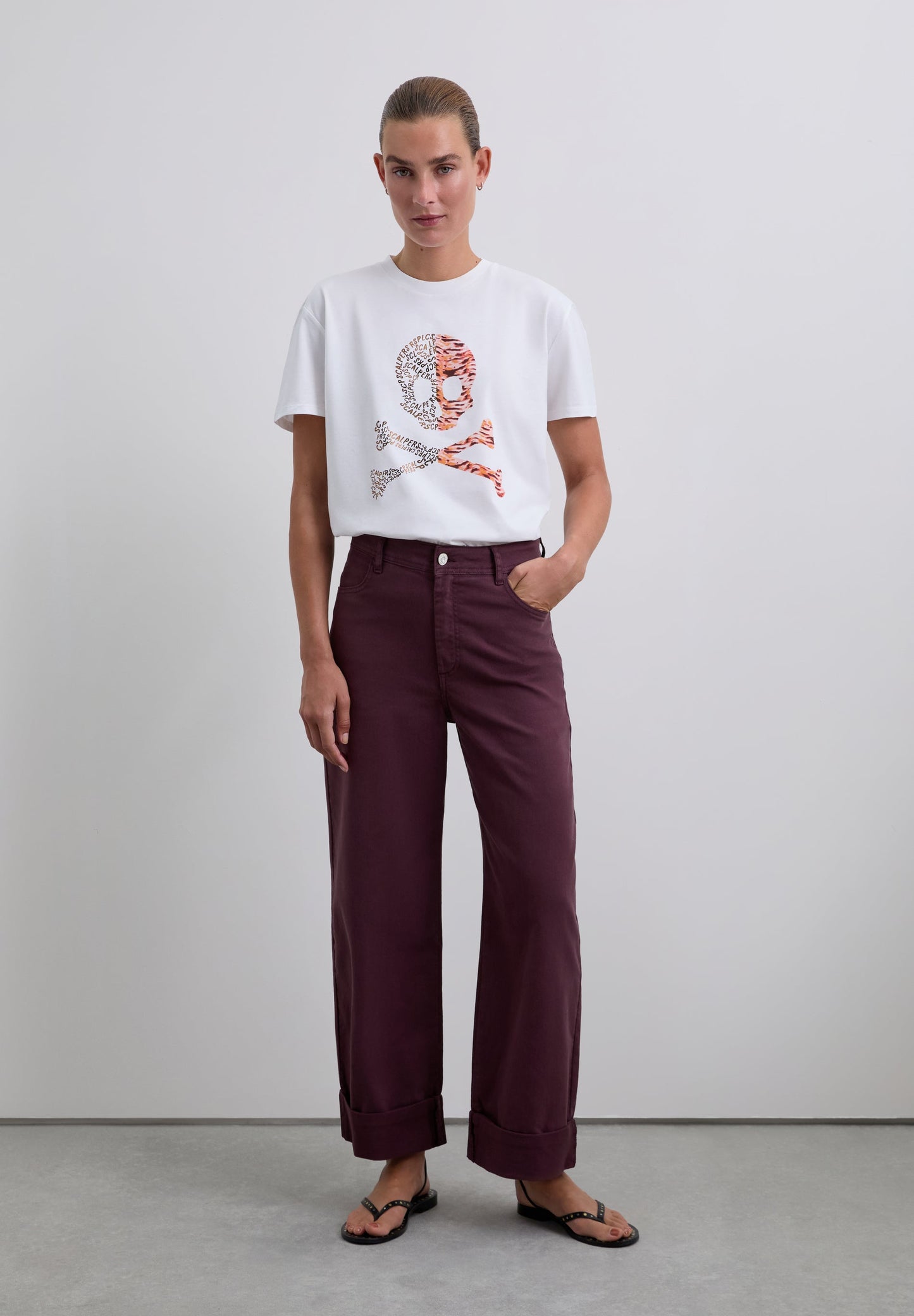 T-SHIRT WITH SKULL PRINT LOGO