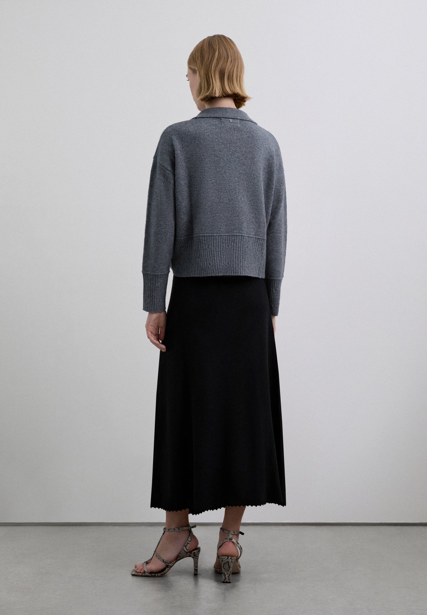 SPECIAL FINISH ASYMMETRIC SKIRT