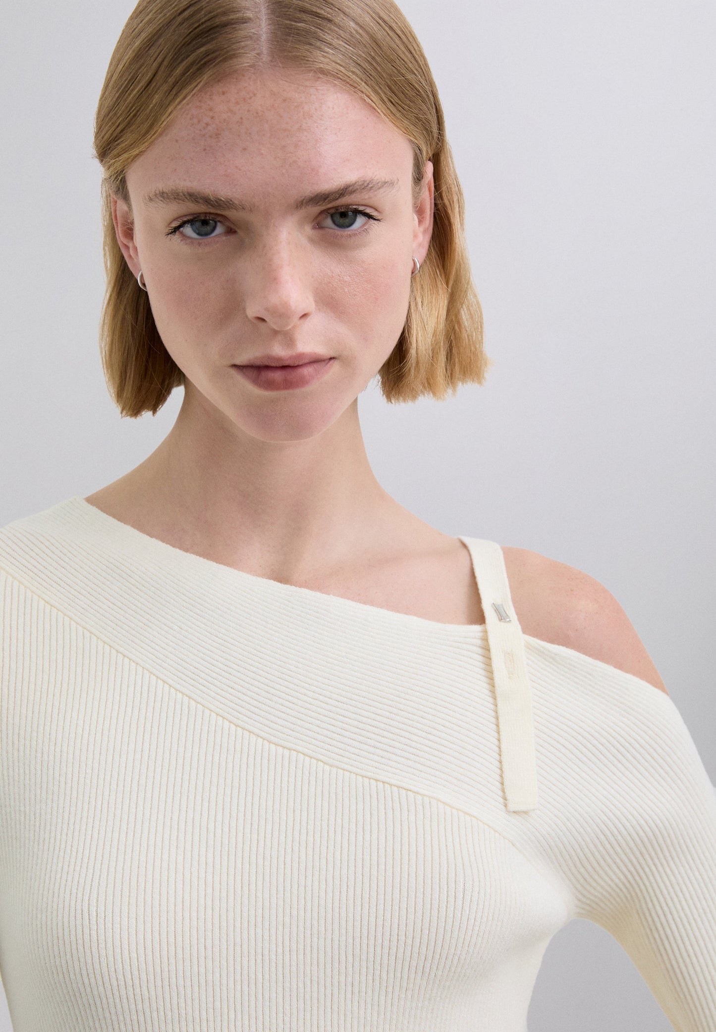 ASYMMETRIC RIBBED SWEATER