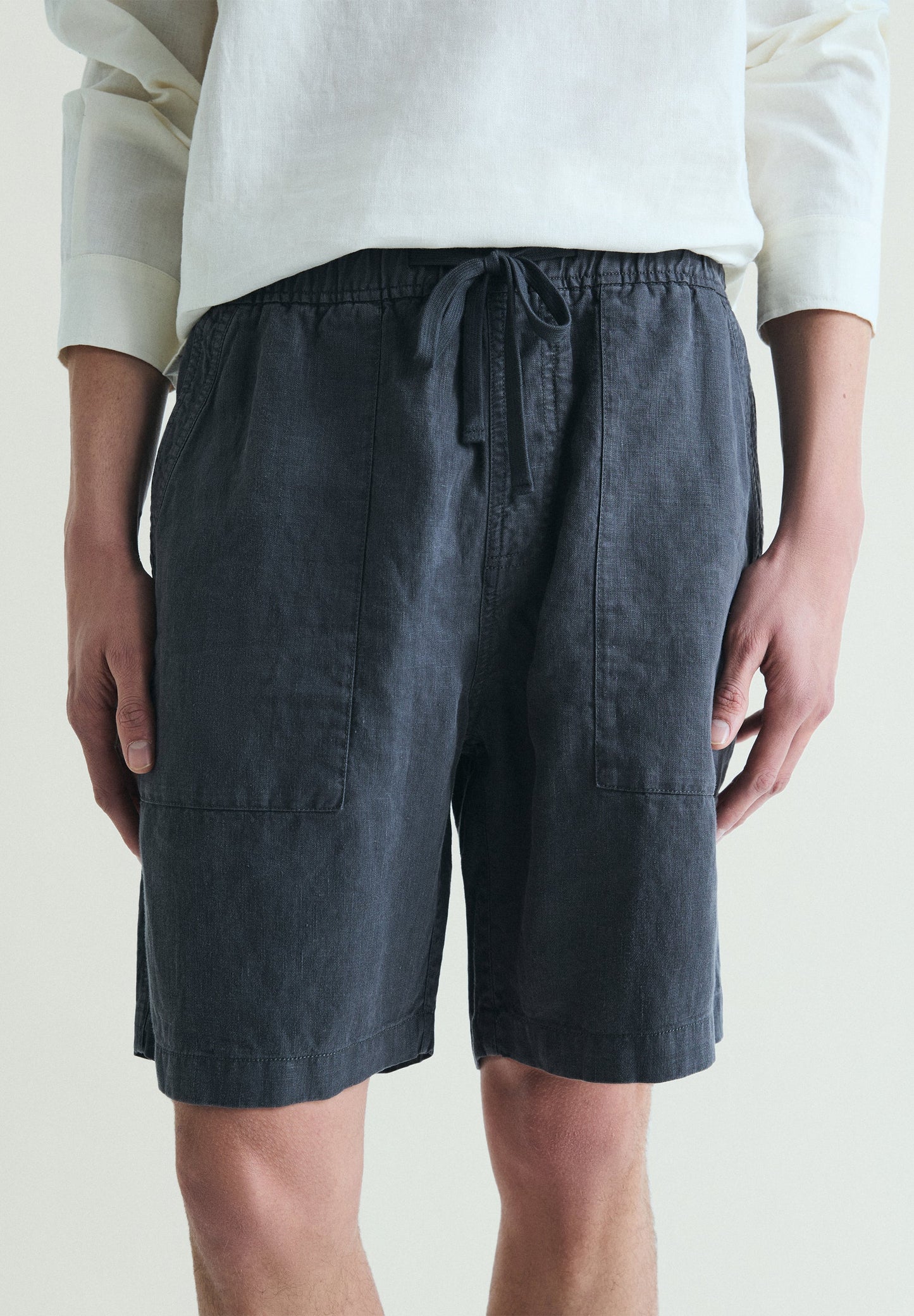 LINEN BERMUDA SHORTS WITH VISIBLE SEAMS