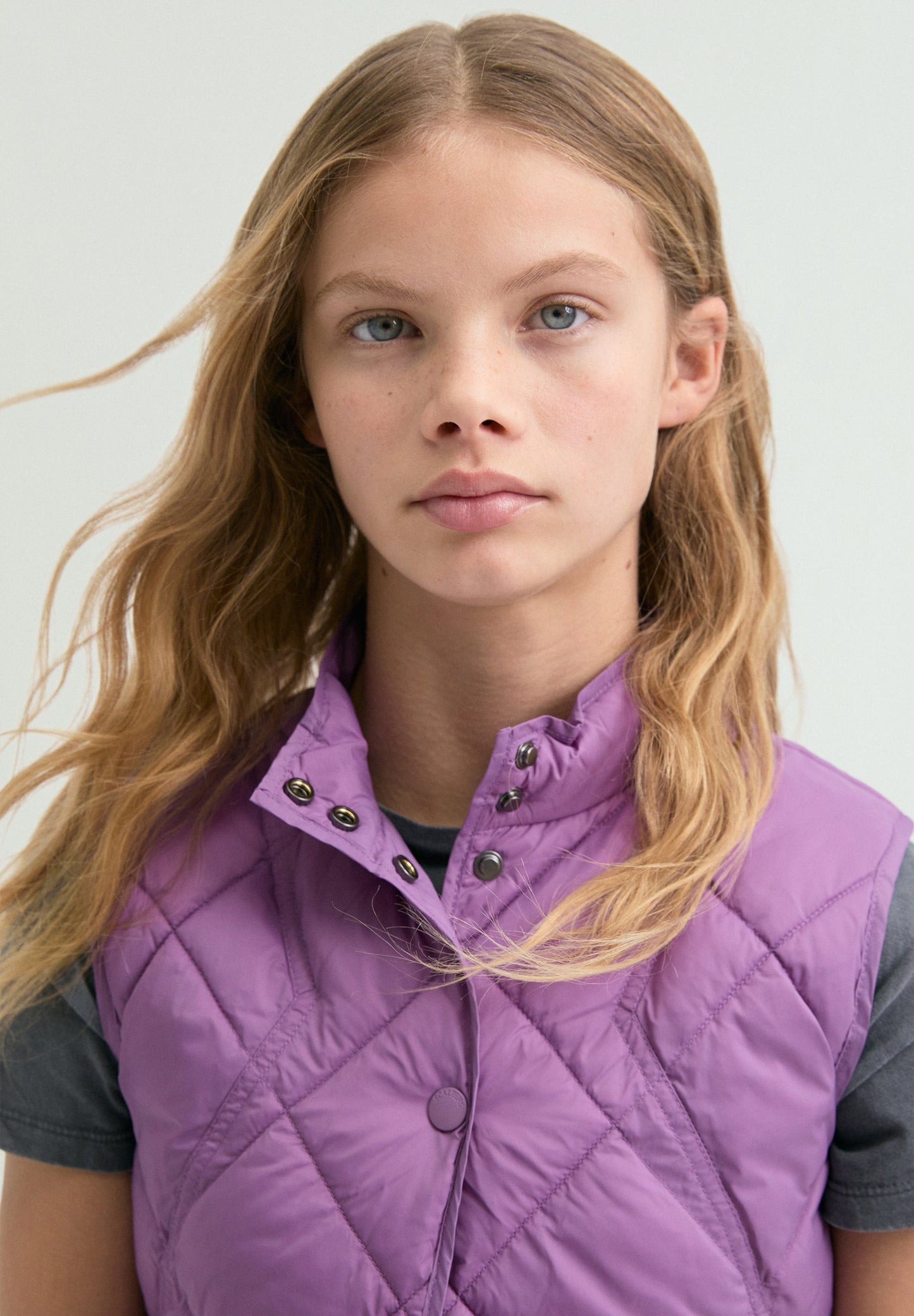 QUILTED GILET WITH STITCHING