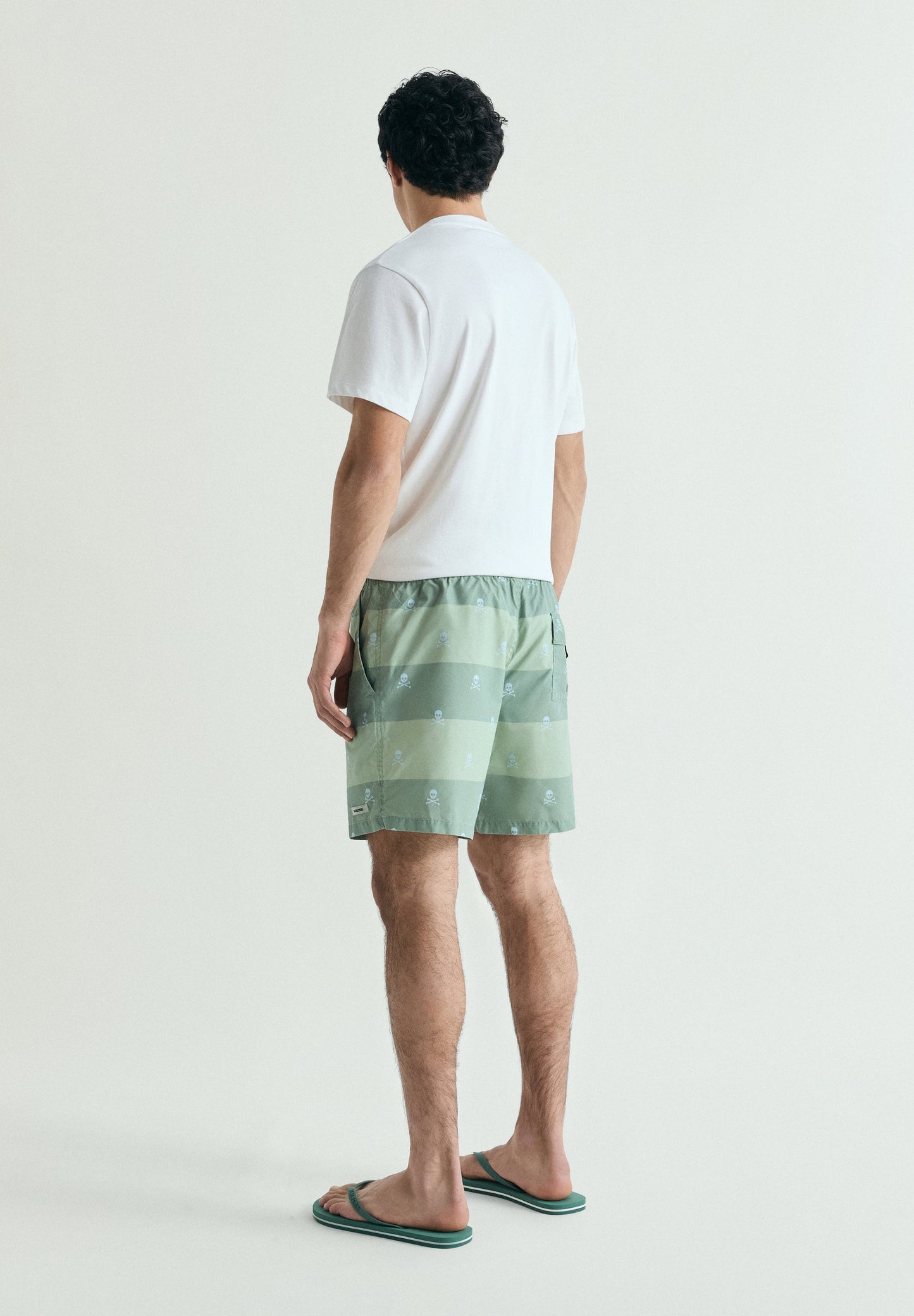 SKULL AND STRIPES SWIMMING TRUNKS