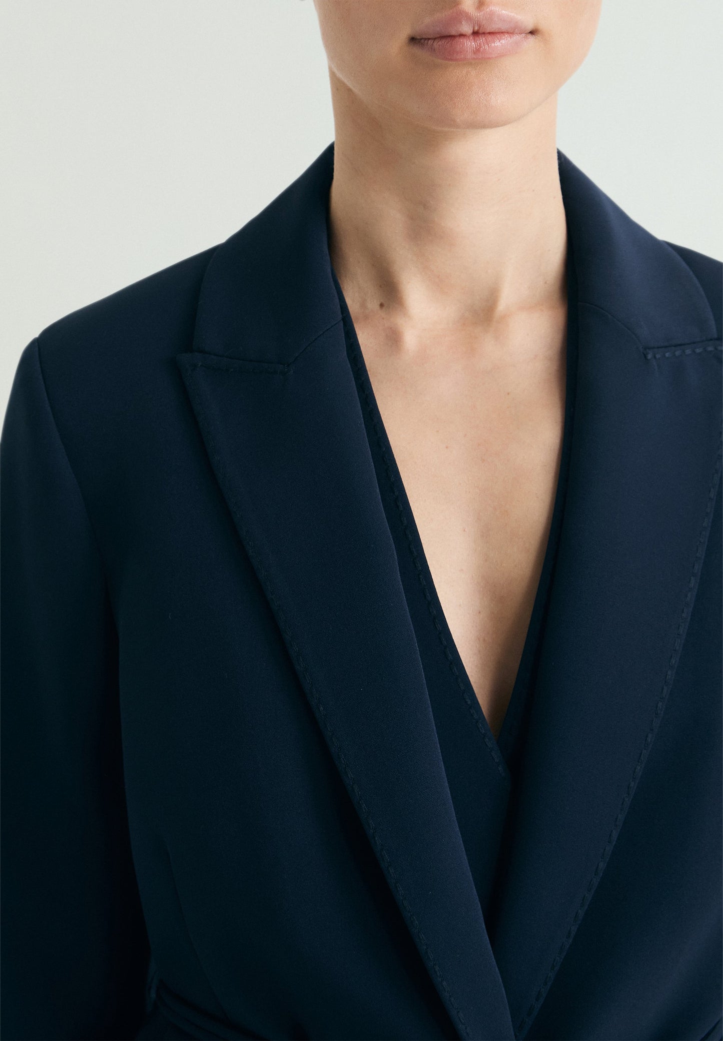 BLAZER WITH KNOT AT THE BELT