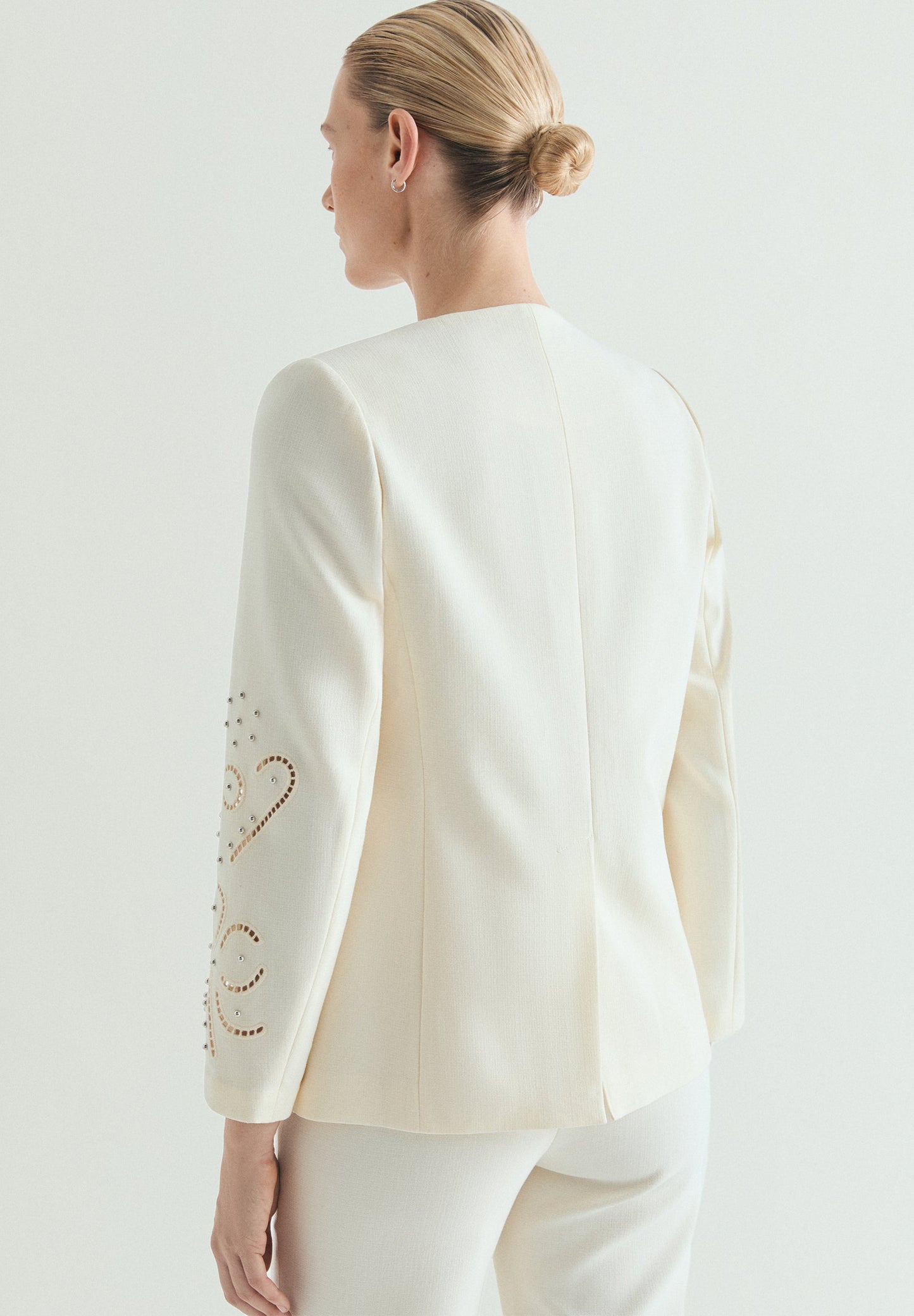 BLAZER WITH PERFORATED DETAILS