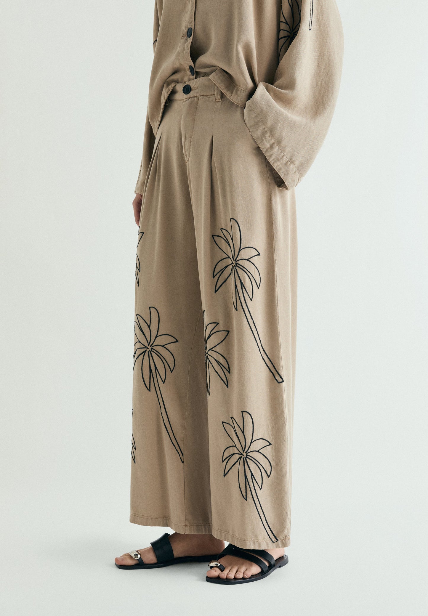 EMBROIDERED FLOWING TROUSERS