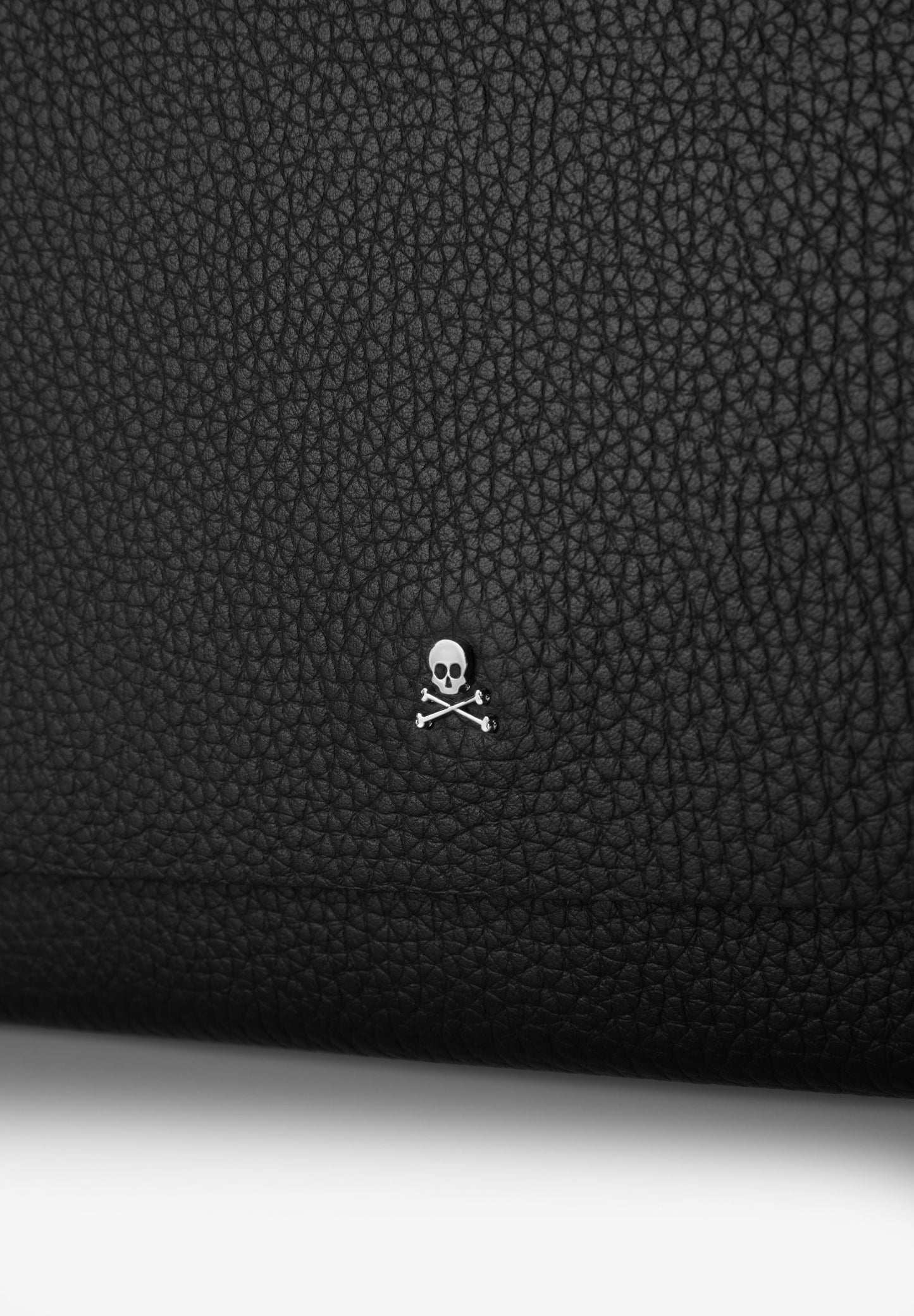 LEATHER BAG WITH APPLIQUÉS