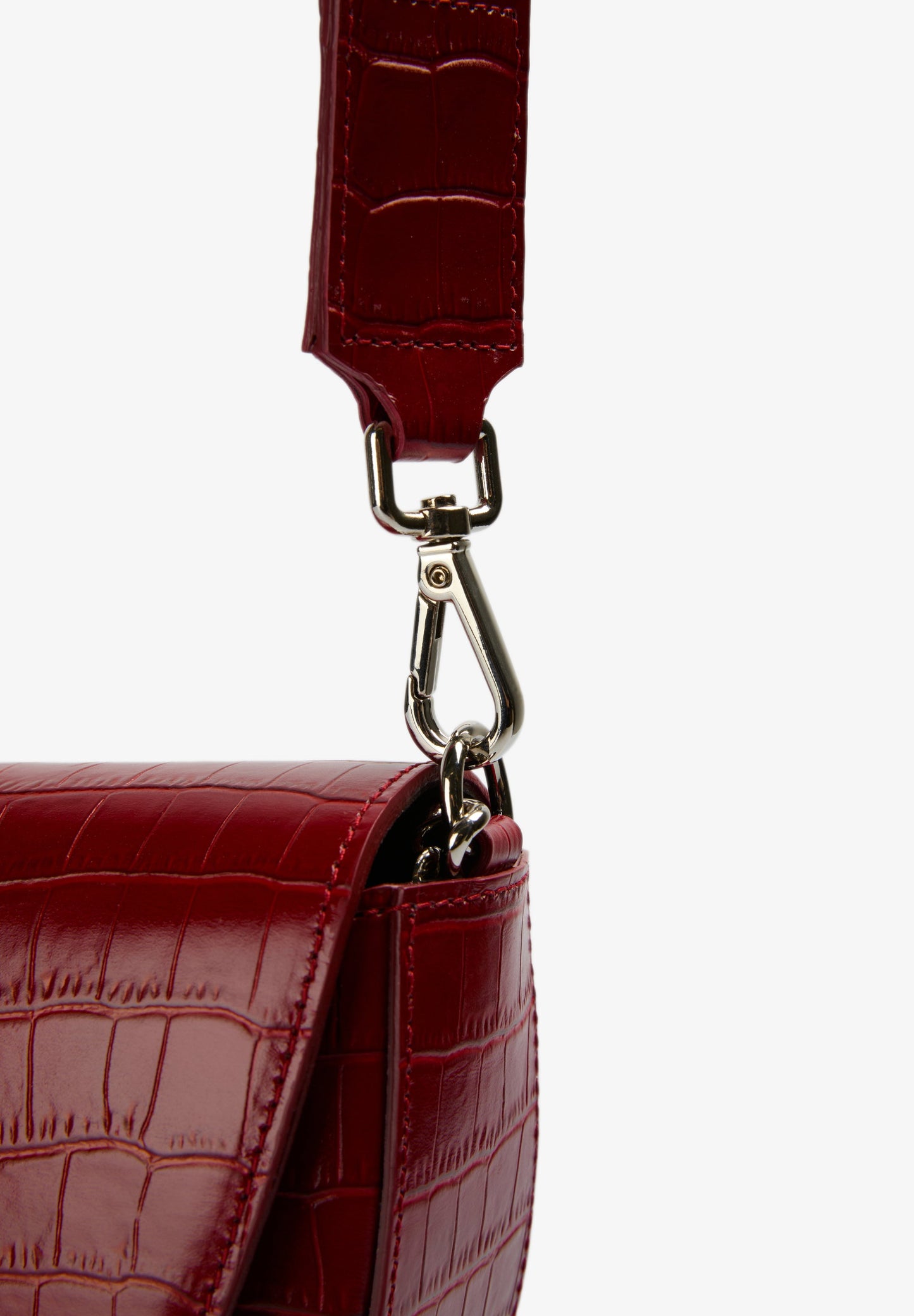 EMBOSSED LEATHER CROSSBODY BAG