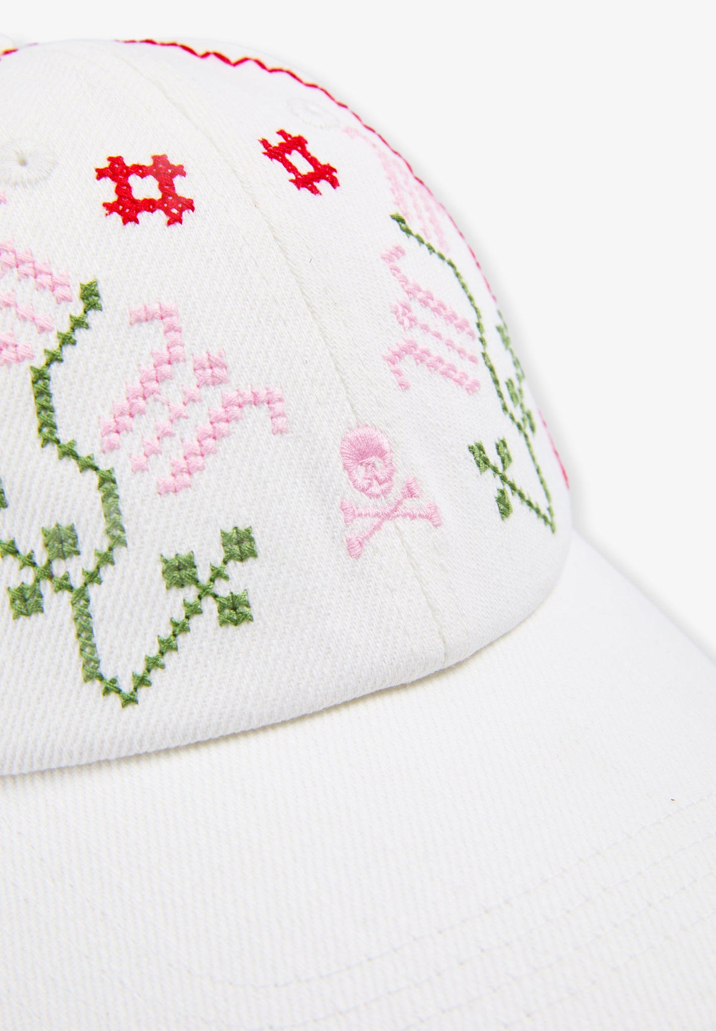 CAP WITH EMBROIDERED DETAILS