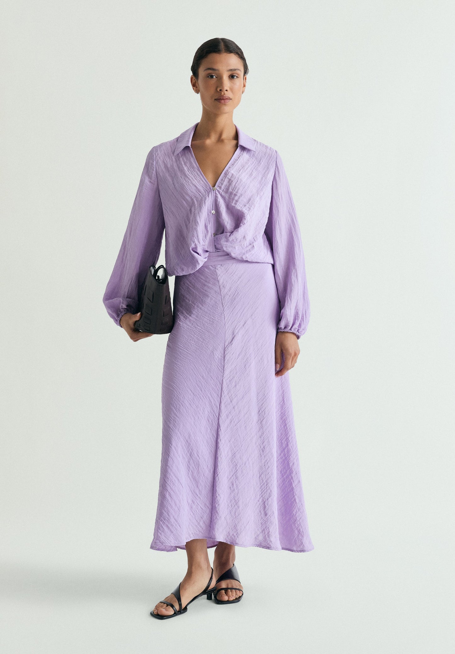 FLOWING BLOUSE WITH CRISS-CROS DETAIL