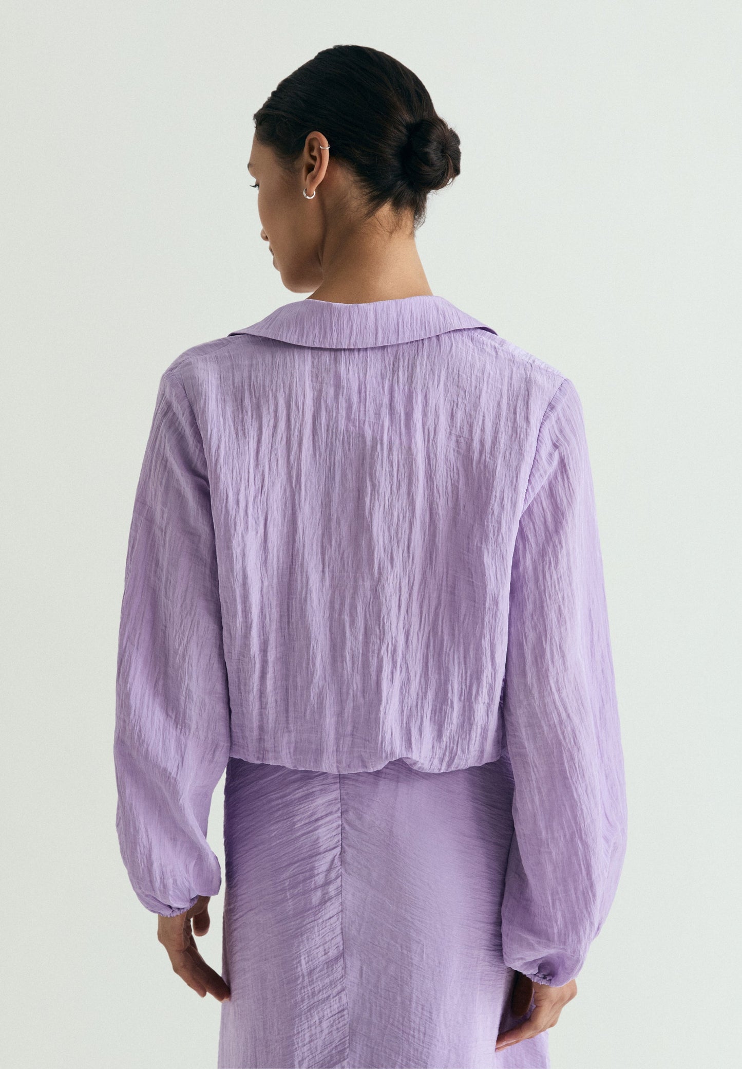 FLOWING BLOUSE WITH CRISS-CROS DETAIL
