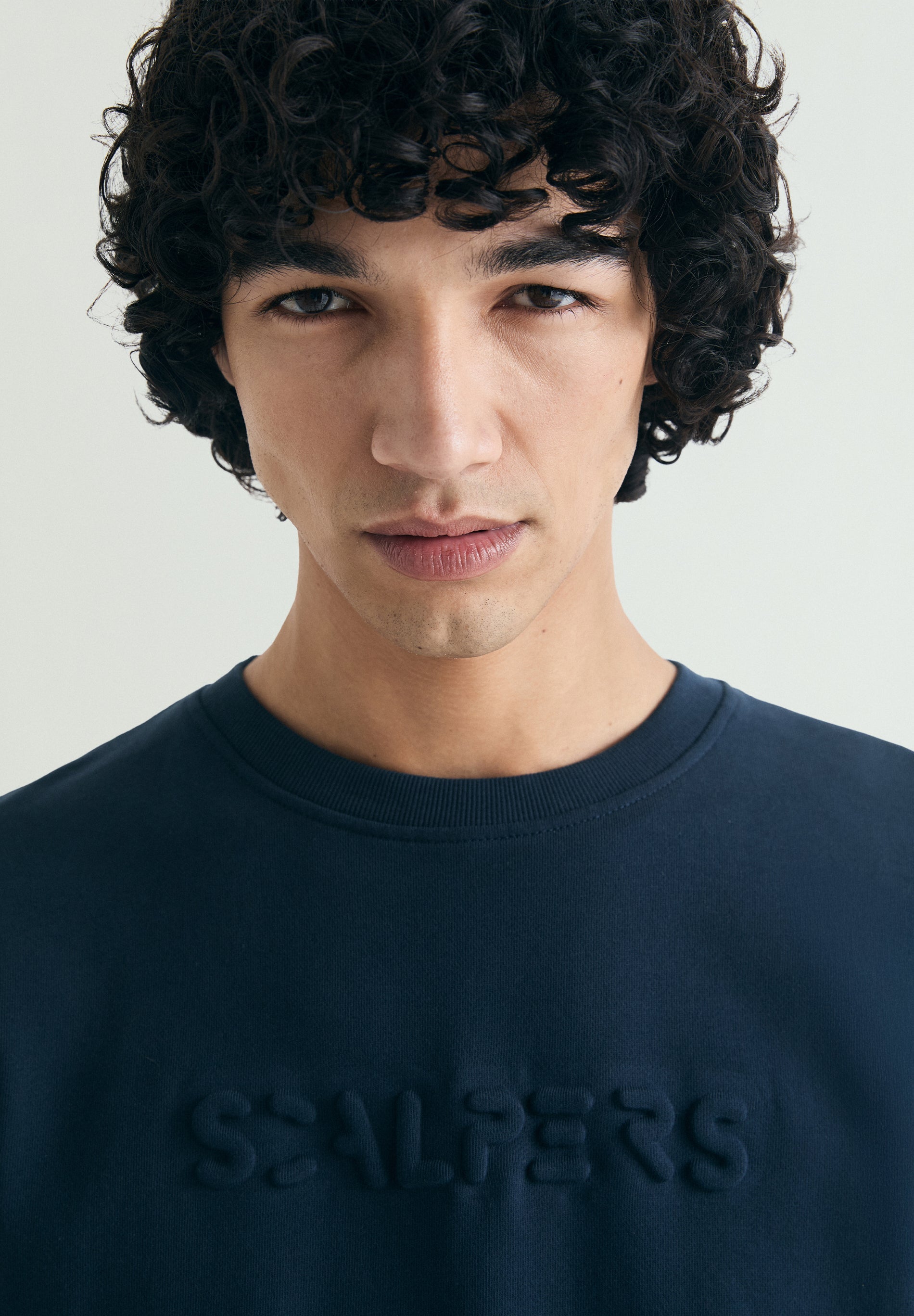 SWEATSHIRT WITH EMBOSSED SKULL