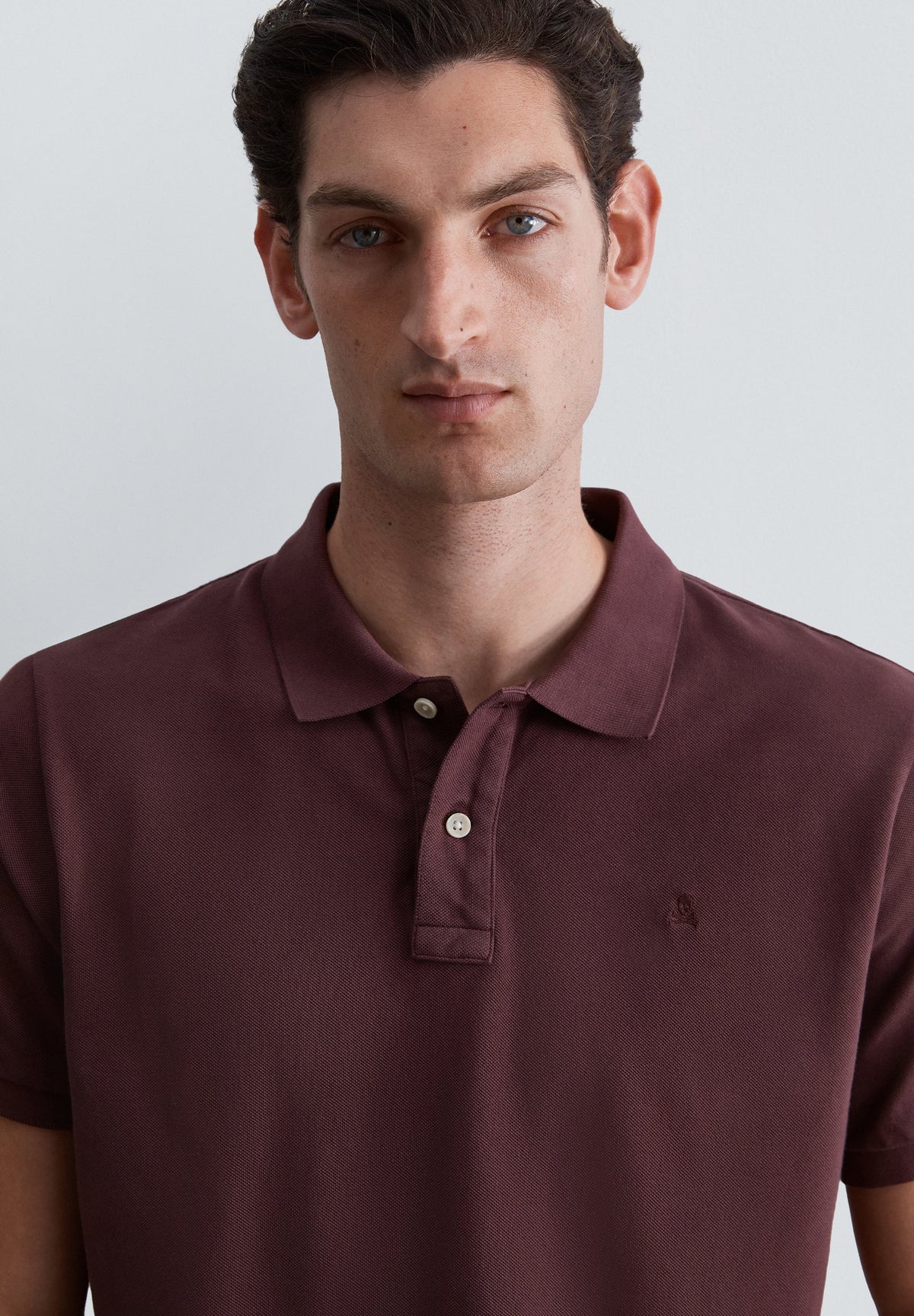 PIQUÉ POLO SHIRT WITH TONAL SKULL