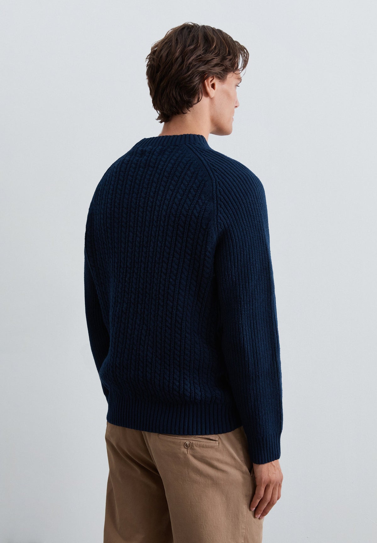 CABLE-KNIT SWEATER