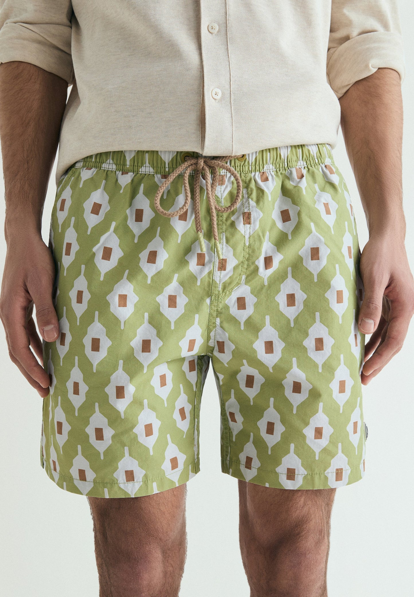GEOMETRIC PRINT SWIMMING TRUNKS
