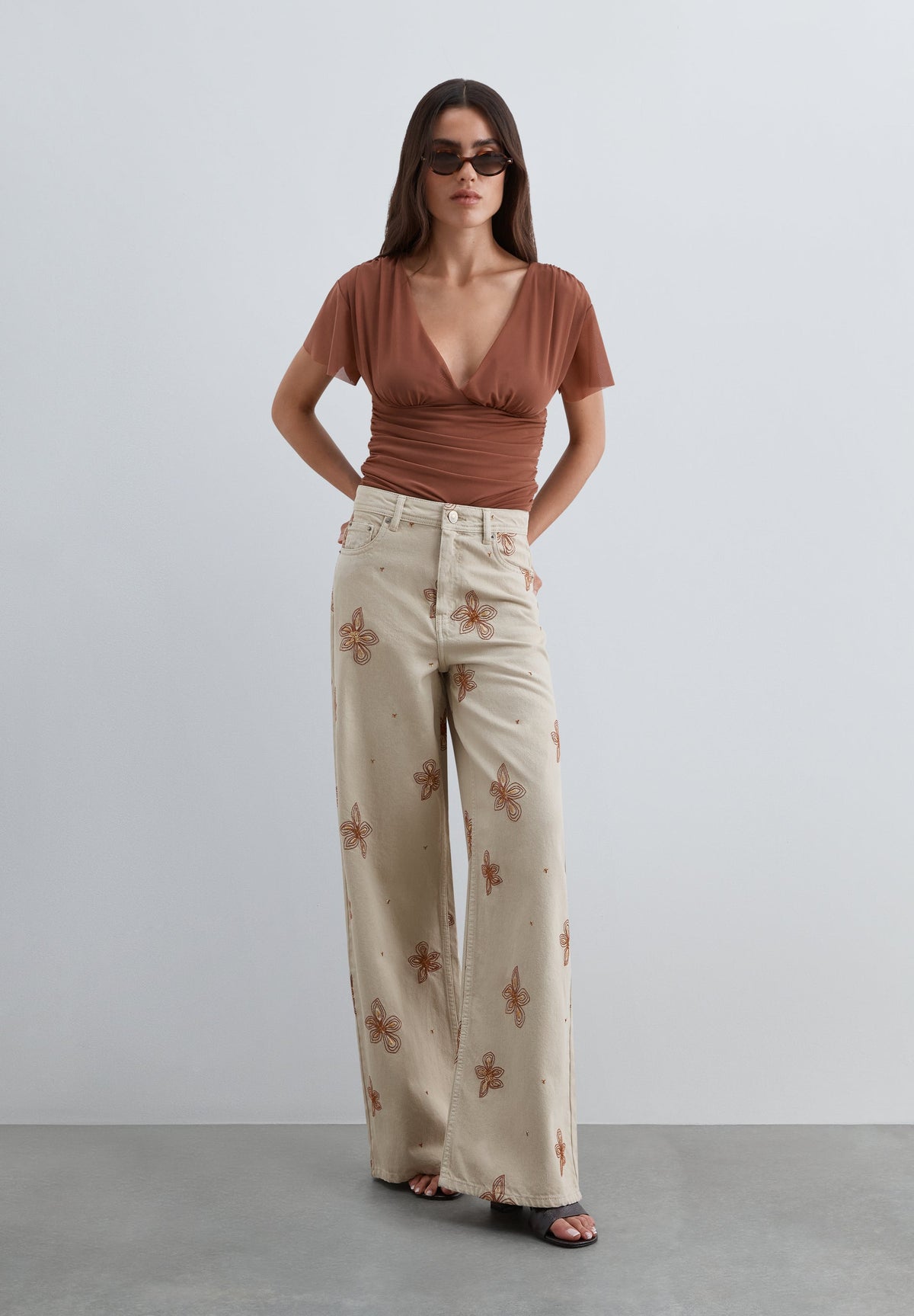 JEANS WITH FLORAL EMBROIDERY