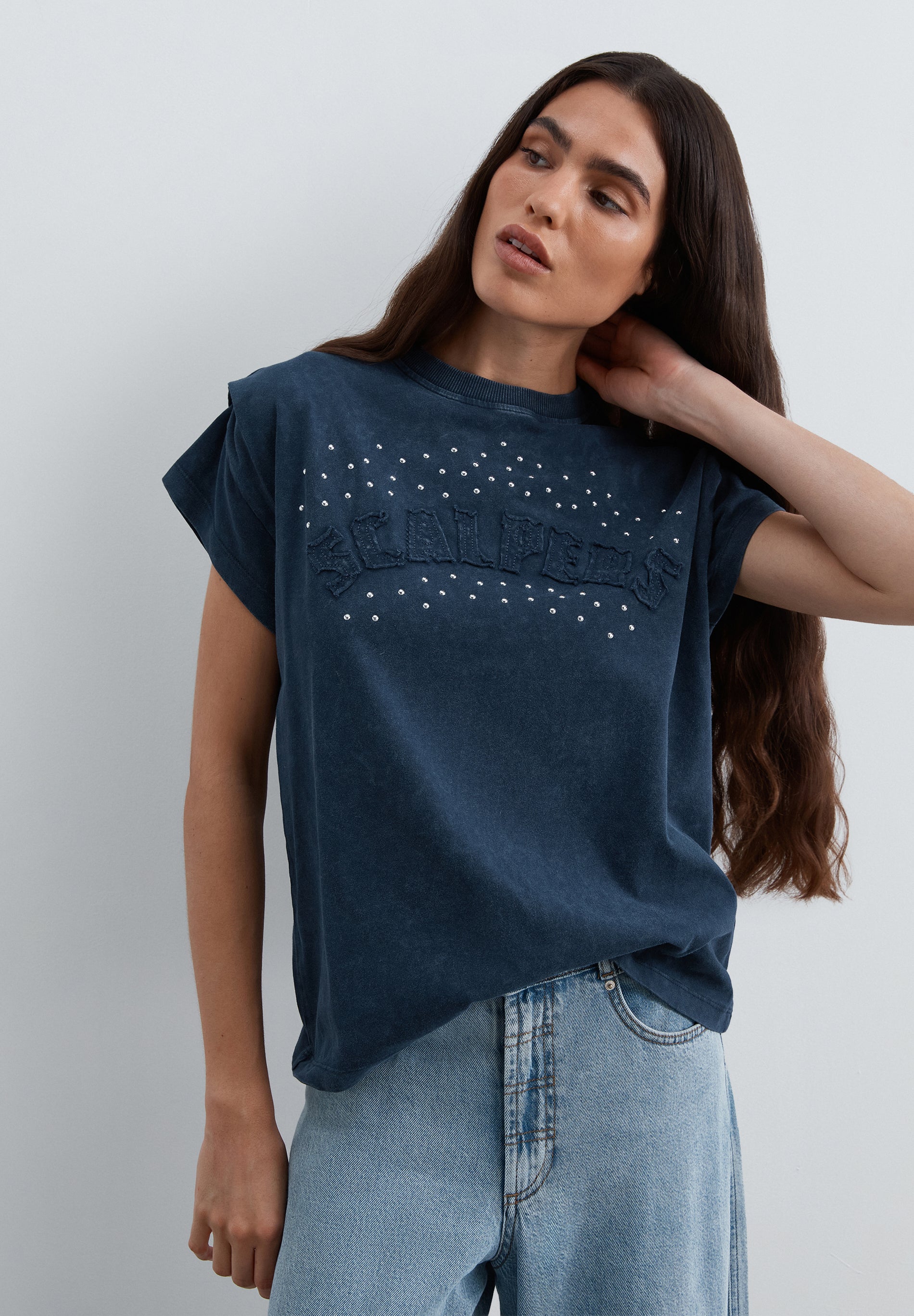 T-SHIRT WITH STUDS AND LOGO PATCH