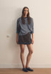 STUDDED LEATHER MINISKIRT