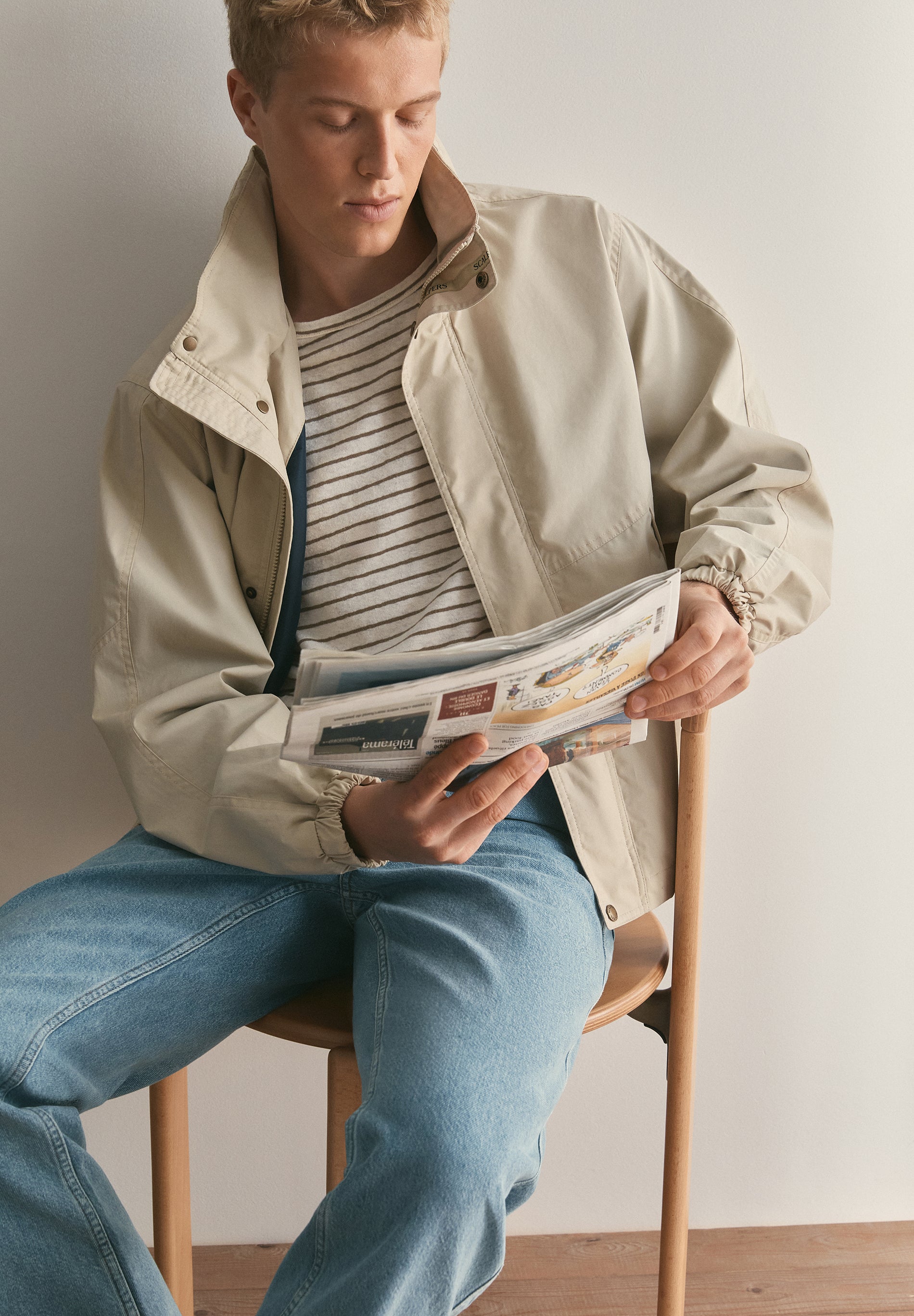 TECHNICAL JACKET WITH CONCEALED HOOD