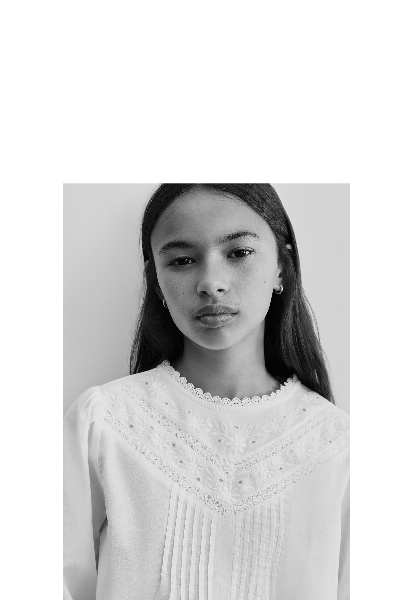 BLOUSE WITH EMBROIDERED NECK DETAILS